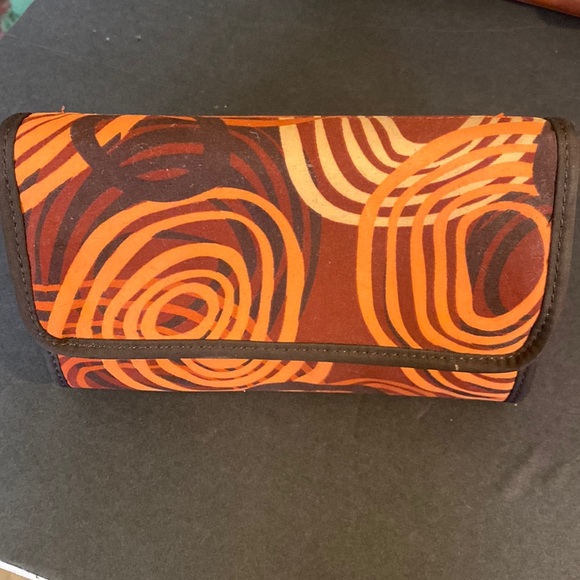VGUC. cosmetic case and a orange burgundy, beige and black 70s looking pattern. - Picture 1 of 6